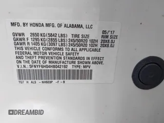 2017 Honda Pilot Elite with VIN 5FNYF6H04HB042192, listed as a IAAI auction lot 41780875 with 158,491 mi miles and . Bid and sale history available at DreamBid. Image 9.