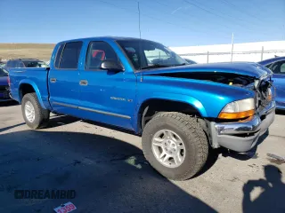 2001 Dodge Dakota Sport with VIN 1B7GG2AN71S112316, listed as a Copart auction lot 50463975 with 216,413 mi miles and Salvage Title. Bid and sale history available at carsss.com. Image 4.