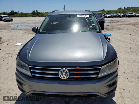 2020 Volkswagen Tiguan SE z VIN 3VV3B7AX9LM083040, wystawiony jako Copart lot #49855254 z przebiegiem 76 171 mil mil oraz Nie do naprawy • Non repairable. Historia ofert i sprzedaży dostępna na DreamBid. Obrazek 5.
