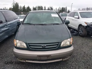 2001 Toyota Sienna LE with VIN 4T3ZF13C91U352296, listed as a IAAI auction lot 41647762 with 262,803 mi miles. Bid and sale history available at carsss.com. Image 12.