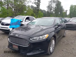 2016 Ford Fusion Energi SE Luxury with VIN 3FA6P0PU7GR293099, listed as a IAAI auction lot 42079873 with 194,755 mi miles. Bid and sale history available at carsss.com. Image 2.