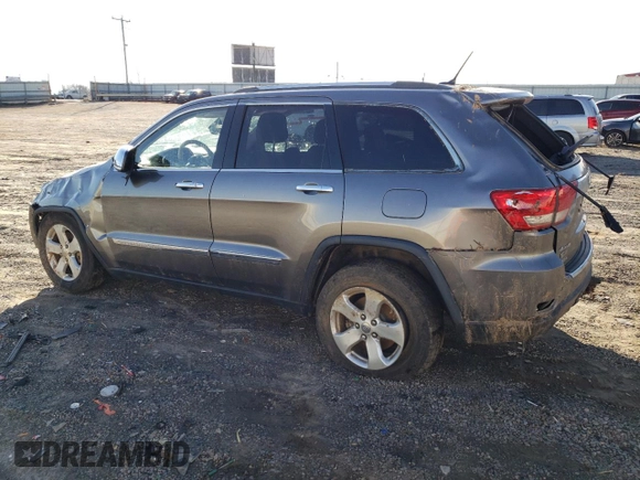 2013 Jeep Grand Cherokee Overland with VIN 1C4RJFCG0DC607214, listed as a Copart auction lot 43672575 with 188,026 mi miles and Salvage Title. Bid and sale history available at carsss.com. Image 2.