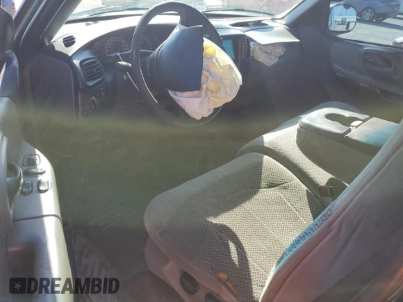 1999 Ford F-150 with VIN 1FTRX17W1XNC25527, listed as a Copart auction lot 48662525 with 150,544 mi miles and Salvage Title. Bid and sale history available at DreamBid. Image 8.
