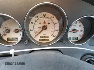 2004 Mercedes-Benz SLK-Class with VIN WDBKK65FX4F300214, listed as a Copart auction lot 82160974 with 75,964 mi miles and Salvage Title. Bid and sale history available at carsss.com. Image 9.
