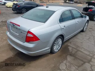 2010 Ford Fusion Hybrid с VIN 3FADP0L38AR296069, выставлен на аукционе IAAI как лот 42760565 с пробегом 94 994 миль миль и . История ставок и продаж доступна на DreamBid. Изображение 4.