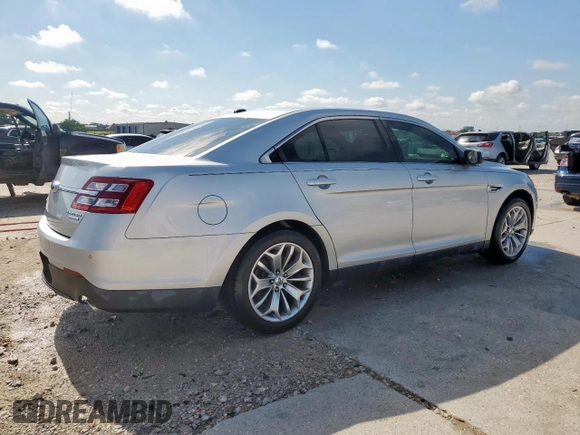 2013 Ford Taurus Limited with VIN 1FAHP2F84DG129904, listed as a Copart auction lot 58218205 with 105,877 mi miles and Salvage title. Bid and sale history available at DreamBid. Image 3.