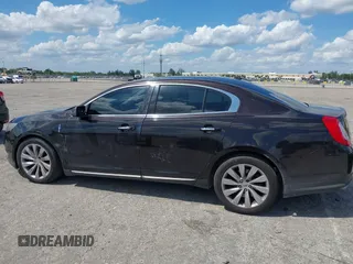 2014 Lincoln MKS with VIN 1LNHL9EK0EG608300, listed as a IAAI auction lot 41900902 with 144,253 mi miles. Bid and sale history available at carsss.com. Image 14.