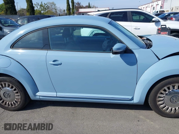 2013 Volkswagen Beetle with VIN 3VWHX7AT4DM667136, listed as a IAAI auction lot 41855778 with 120,300 mi miles and . Bid and sale history available at DreamBid. Image 14.