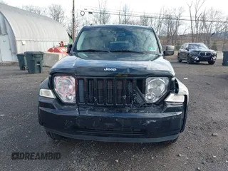 2012 Jeep Liberty Sport with VIN 1C4PJMAKXCW153053, listed as a IAAI auction lot 41728329 with 81,866 mi miles and . Bid and sale history available at DreamBid. Image 6.