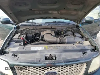 2003 Ford F-150 XL with VIN 1FTRX07WX3KB99581, listed as a Copart auction lot 56907765 with 232,597 mi miles and Salvage title. Bid and sale history available at DreamBid. Image 11.
