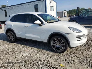 2012 Porsche Cayenne with VIN WP1AA2A2XCLA10081, listed as a Copart auction lot 55394935 with 181,316 mi miles and Salvage title. Bid and sale history available at DreamBid. Image 4.