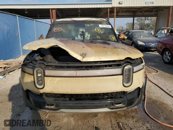 2023 Rivian R1T Adventure z VIN 7FCTGBAA6PN028517, wystawiony jako Copart lot #73712354 z przebiegiem Nie podano mil oraz Nie do naprawy. Historia ofert i sprzedaży dostępna na DreamBid. Obrazek 5.