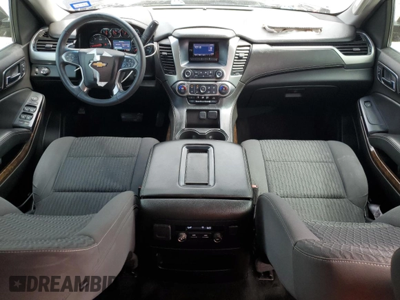 2015 Chevrolet Tahoe LS with VIN 1GNSCAKC4FR116004, listed as a Copart auction lot 54599375 with 87,645 mi miles and Salvage title. Bid and sale history available at DreamBid. Image 8.