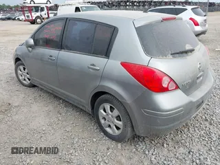 2009 Nissan Versa S with VIN 3N1BC13E99L390449, listed as a IAAI auction lot 42129663 with 129,066 mi miles and . Bid and sale history available at DreamBid. Image 3.