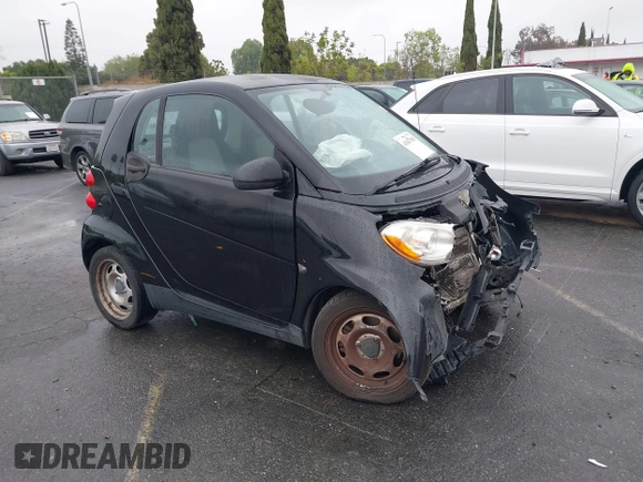 2012 Smart fortwo Pure z VIN WMEEJ3BA9CK521416, wystawiony jako IAAI lot #41847989 z przebiegiem Nie podano mil oraz . Historia ofert i sprzedaży dostępna na DreamBid. Obrazek 1.