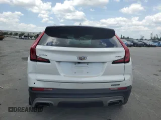 2020 Cadillac XT4 FWD Premium Luxury z VIN 1GYFZCR4XLF005029, wystawiony jako Copart lot #55274025 z przebiegiem 50 550 mil mil oraz Szkoda całkowita • Salvage title. Historia ofert i sprzedaży dostępna na DreamBid. Obrazek 6.