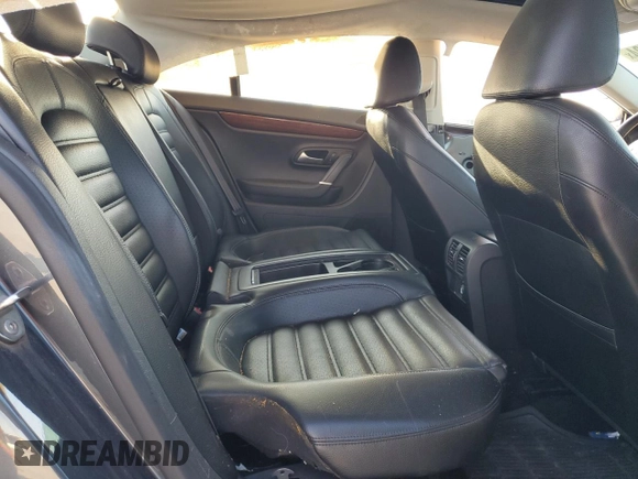 2012 Volkswagen CC Lux Limited with VIN WVWHN7AN5CE537803, listed as a Copart auction lot 82511734 with 124,416 mi miles and Salvage Title. Bid and sale history available at carsss.com. Image 10.