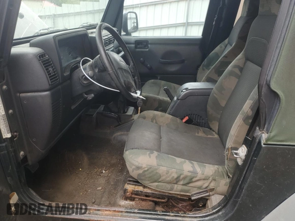 2005 Jeep Wrangler X with VIN 1J4FA39S65P319487, listed as a Copart auction lot 71848394 with 161,574 mi miles and Salvage Title. Bid and sale history available at carsss.com. Image 7.
