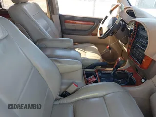 2000 Lexus LX 470 with VIN JT6HT00WXY0079873, listed as a IAAI auction lot 41605770 with 302,758 mi miles and . Bid and sale history available at DreamBid. Image 5.