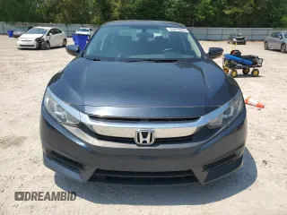 2017 Honda Civic LX z VIN 19XFC2F55HE026662, wystawiony jako Copart lot #55019905 z przebiegiem 81 075 mil mil oraz Szkoda całkowita • Salvage title. Historia ofert i sprzedaży dostępna na DreamBid. Obrazek 5.