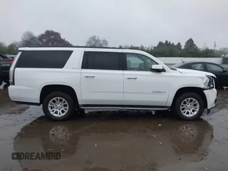 2015 GMC Yukon XL SLT with VIN 1GKS1HKC7FR223513, listed as a IAAI auction lot 40822575 with 128,239 mi miles. Bid and sale history available at carsss.com. Image 13.
