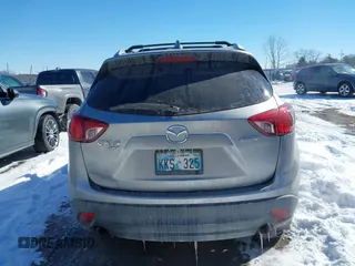 2013 Mazda CX-5 Grand Touring with VIN JM3KE4DE4D0168115, listed as a IAAI auction lot 41610004 with 190,690 mi miles. Bid and sale history available at carsss.com. Image 17.