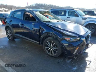 2017 Mazda CX-3 Touring with VIN JM1DKFC75H0157610, listed as a IAAI auction lot 41326591 with 51,291 mi miles. Bid and sale history available at carsss.com. Image 1.