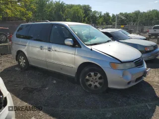 2003 Honda Odyssey EX-L z VIN 5FNRL18903B007639, wystawiony jako Copart lot #57230975 z przebiegiem 189 235 mil mil oraz Szkoda całkowita • Salvage title. Historia ofert i sprzedaży dostępna na DreamBid. Obrazek 4.