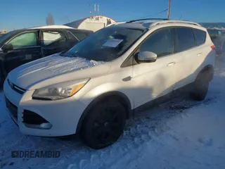 2016 Ford Escape Titanium with VIN 1FMCU9J94GUC81270, listed as a IAAI auction lot 41502724 with 128,161 mi miles. Bid and sale history available at carsss.com. Image 2.