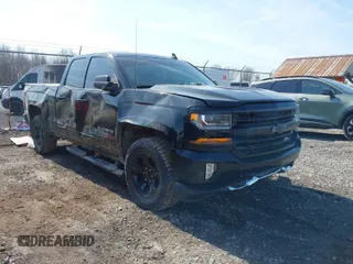 2017 Chevrolet Silverado 1500 LT with VIN 1GCVKREC1HZ285337, listed as a IAAI auction lot 41781910 with 136,895 mi miles. Bid and sale history available at carsss.com. Image 1.