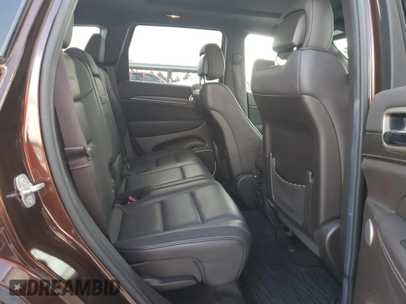 2014 Jeep Grand Cherokee Summit с VIN 1C4RJEJG4EC380074, выставлен на аукционе Copart как лот 64123175 с пробегом 237 803 миль миль и Списание • Salvage title. История ставок и продаж доступна на DreamBid. Изображение 11.