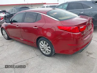 2014 Kia Optima EX z VIN 5XXGN4A71EG284280, wystawiony jako IAAI lot #42278795 z przebiegiem 179 200 mil mil oraz . Historia ofert i sprzedaży dostępna na DreamBid. Obrazek 3.