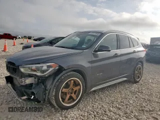 2017 BMW X1 xDrive28i with VIN WBXHT3C38H5F73671, listed as a Copart auction lot 61911945 with 117,335 mi miles and Salvage title. Bid and sale history available at DreamBid. Image 1.