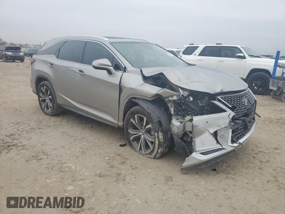 2021 Lexus RX 350L with VIN JTJHZKEA3M2022121, listed as a Copart auction lot 83263024 with 39,684 mi miles and Salvage title. Bid and sale history available at DreamBid. Image 4.