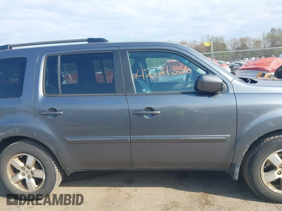 2011 Honda Pilot EX-L with VIN 5FNYF4H57BB107110, listed as a IAAI auction lot 42121356 with 300,169 mi miles and . Bid and sale history available at carsss.com. Image 13.