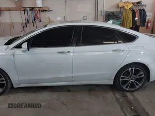 2019 Ford Fusion Titanium with VIN 3FA6P0D92KR153096, listed as a IAAI auction lot 41679393 with 127,292 mi miles and . Bid and sale history available at DreamBid. Image 15.