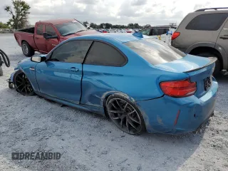 2018 BMW M2 z VIN WBS1J5C53JVD36649, wystawiony jako Copart lot #57961455 z przebiegiem 55 751 mil mil oraz Szkoda całkowita • Salvage title. Historia ofert i sprzedaży dostępna na DreamBid. Obrazek 2.