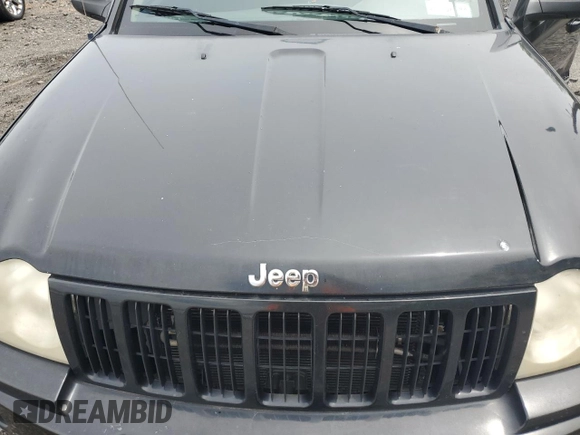 2007 Jeep Grand Cherokee Laredo z VIN 1J8GR48K47C681735, wystawiony jako Copart lot #59006435 z przebiegiem 195 517 mil mil oraz Nie do naprawy • Non repairable. Historia ofert i sprzedaży dostępna na DreamBid. Obrazek 12.