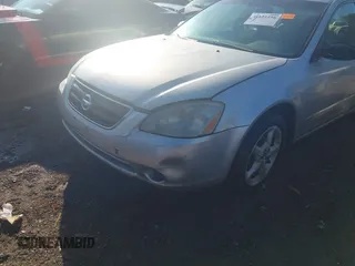 2004 Nissan Altima S with VIN 1N4AL11D34C140198, listed as a IAAI auction lot 41821256 with 182,905 mi miles. Bid and sale history available at carsss.com. Image 6.