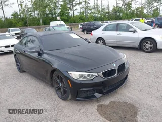 2015 BMW 4 Series 428i with VIN WBA3N3C55FK232319, listed as a IAAI auction lot 42136421 with 140,300 mi miles and . Bid and sale history available at carsss.com. Image 1.