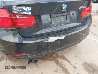 2012 BMW 3 Series 328i with VIN WBA3A5G51CNP17522, listed as a IAAI auction lot 42124868 with 154,385 mi miles and . Bid and sale history available at carsss.com. Image 6.