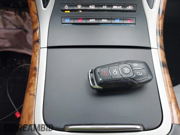 2016 Lincoln MKX Reserve with VIN 2LMTJ8LP0GBL31400, listed as a IAAI auction lot 42073406 with 136,551 mi miles. Bid and sale history available at carsss.com. Image 11.
