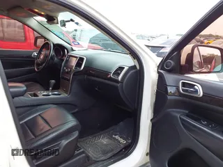 2012 Jeep Grand Cherokee Laredo with VIN 1C4RJFAG8CC124877, listed as a IAAI auction lot 41940603 with 254,356 mi miles. Bid and sale history available at carsss.com. Image 5.