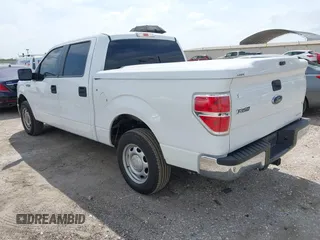2014 Ford F-150 XL with VIN 1FTEW1CMXEKD40762, listed as a IAAI auction lot 42400704 with 75,769 mi miles and . Bid and sale history available at DreamBid. Image 3.