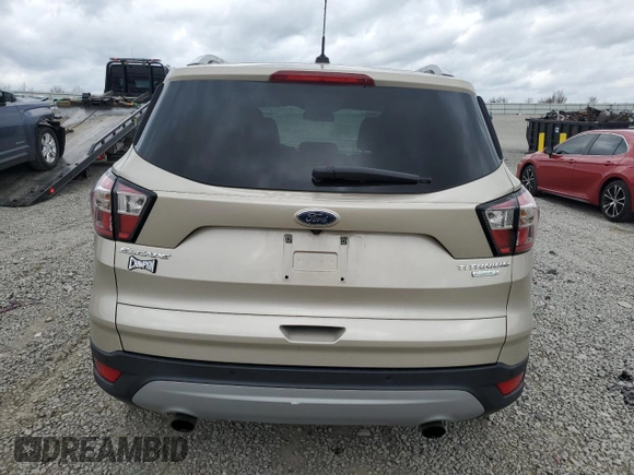 2017 Ford Escape Titanium with VIN 1FMCU0J98HUD75004, listed as a Copart auction lot 51627805 with 74,166 mi miles and Salvage Title. Bid and sale history available at carsss.com. Image 6.