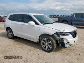 2020 Cadillac XT6 FWD Premium Luxury z VIN 1GYKPCRS9LZ107178, wystawiony jako Copart lot #58789335 z przebiegiem 154 428 mil mil oraz Nie do naprawy. Historia ofert i sprzedaży dostępna na DreamBid. Obrazek 4.