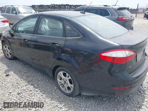 2014 Ford Fiesta SE z VIN 3FADP4BJXEM232657, wystawiony jako IAAI lot #42132147 z przebiegiem 290 396 mil mil oraz . Historia ofert i sprzedaży dostępna na DreamBid. Obrazek 3.