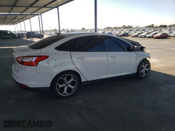 2012 Ford Focus SE with VIN 1FAHP3F20CL468537, listed as a Copart auction lot 64408615 with 173,753 mi miles and Salvage title. Bid and sale history available at DreamBid. Image 3.