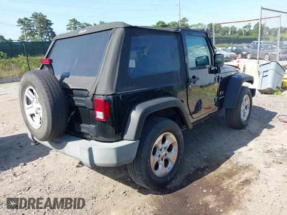 2009 Jeep Wrangler X with VIN 1J4FA24179L711352, listed as a IAAI auction lot 42577898 with 133,309 mi miles and . Bid and sale history available at DreamBid. Image 4.