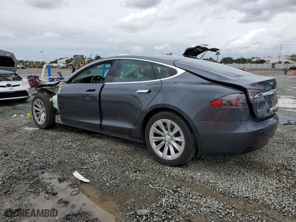 2017 Tesla Model S 100D with VIN 5YJSA1E29HF205514, listed as a Copart auction lot 48915695 with 61,801 mi miles and Salvage Title. Bid and sale history available at carsss.com. Image 2.